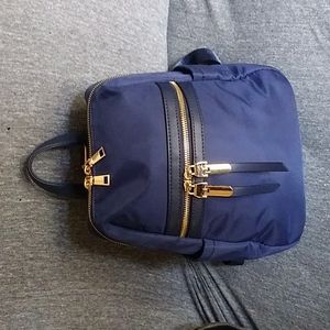 Blue Nylon mini backpack purse.